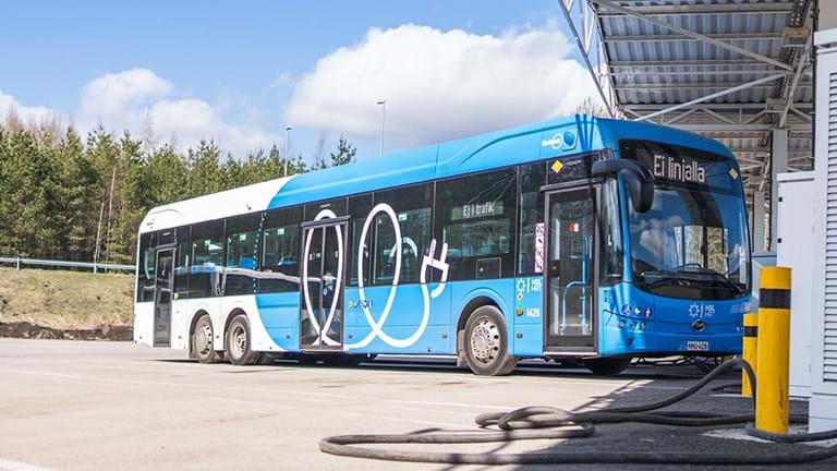 Blue and white electrical bus in Helsinki